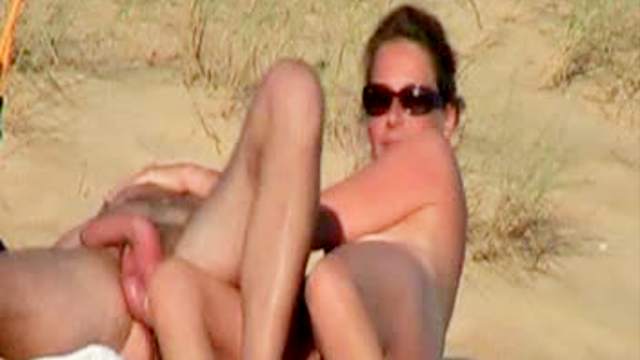 Naked couple at beach