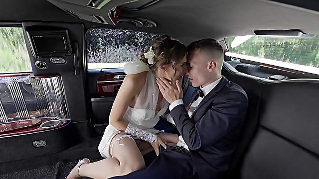 Aroused bride fucks with the limo driver on the backseat