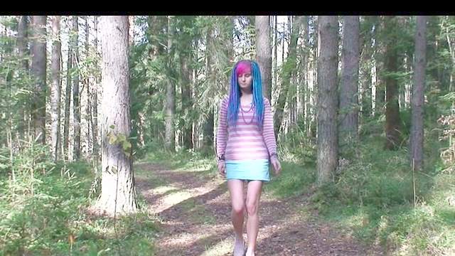 Punk teen takes a piss in the woods