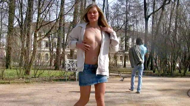 Pretty girl models tits in public