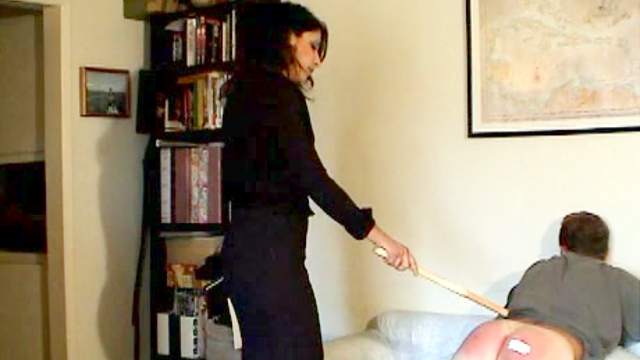Ass paddled and caned by mistress