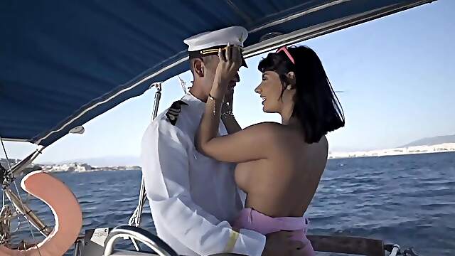 Strong sexual sensations out at sea for a busty brunette on fire