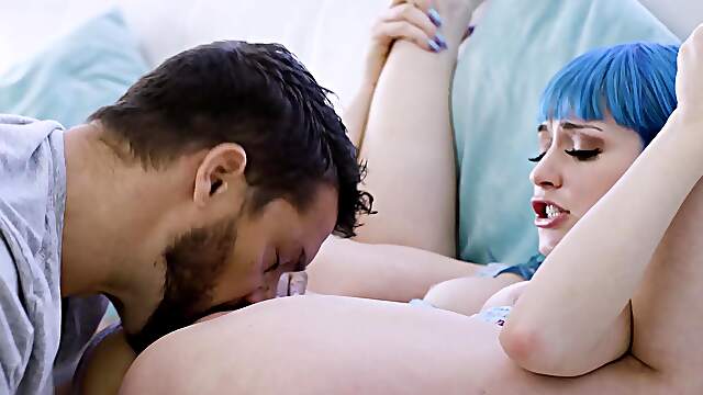 Two guys and two girls having a good time on the sofa