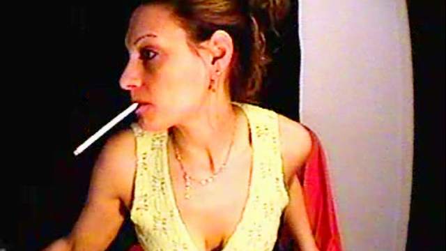 Brunette makes webcam smoking tease video