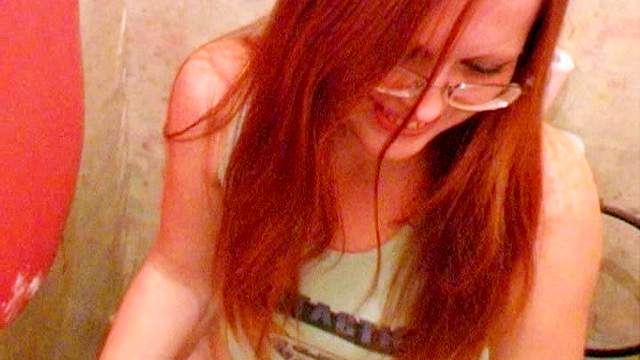 Redhead nerd goes piss on camera