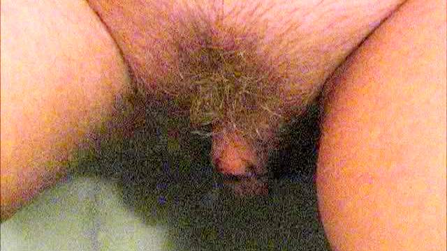 Milf pissing in the bathroom