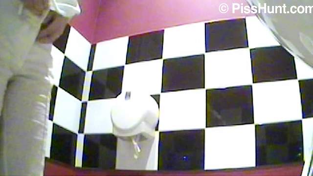 Spy camera captures bathroom pissing