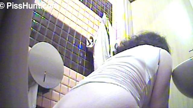 Public bathroom piss on hidden camera