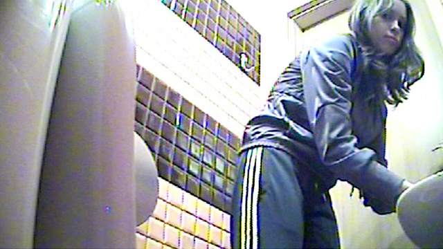 Chick in sporty pants spycam pissing