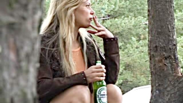 Smoking and drinking girl goes piss