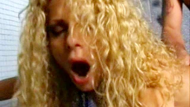 Transsexual with curly blonde hair laid