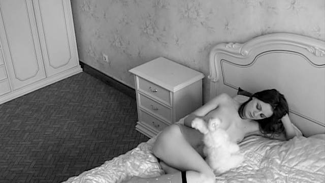 Teen and her teddy bear alone in bedroom