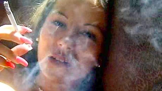 Smoker with beautiful lips and hot tits