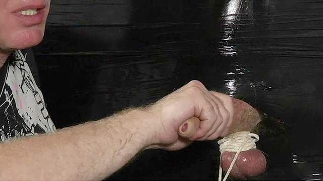 Gay daddy has fun with bondage submissive