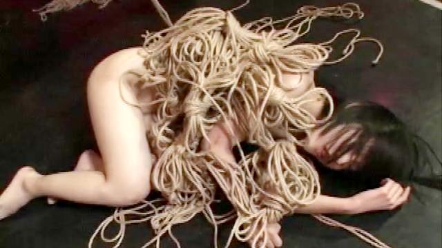 Extreme rope bondage for Asian girl