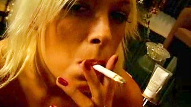 Lipstick girl sucks cock and cigarette