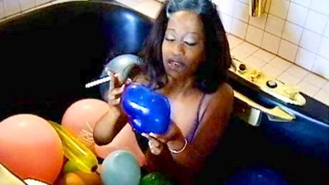 Black chick smoking with balloons