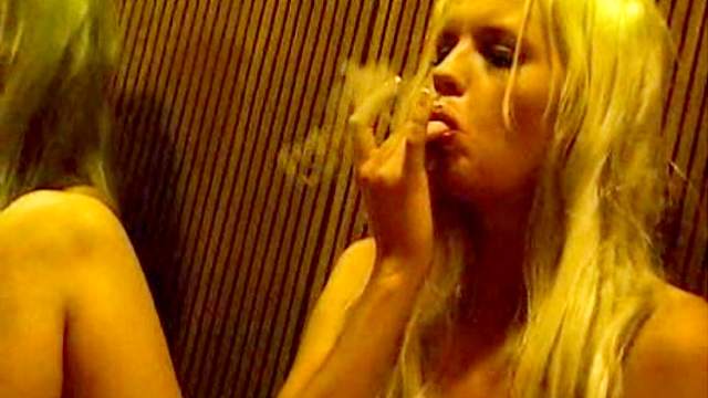 Smoker puts a finger in her pussy