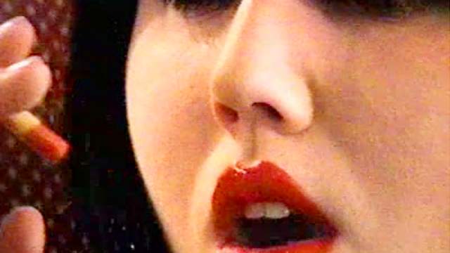 Goth girls smoking in fetish video