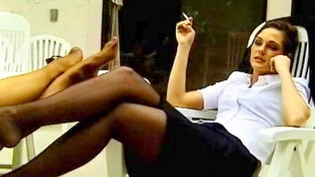 Skirt and blouse girl smokes a cigarette