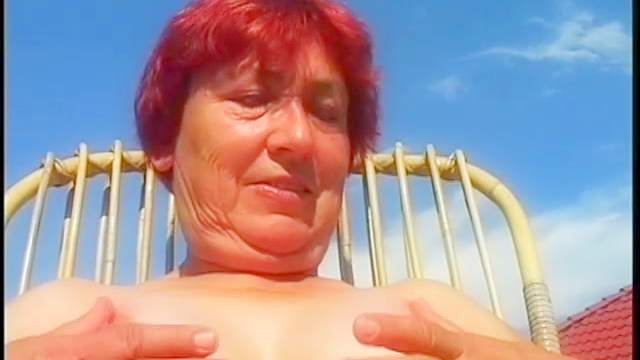 Mature redhead with fat tits fucked outdoors