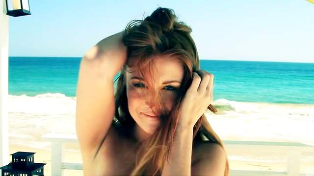 Redhead Leanna Decker at the ocean beach