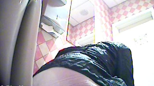 Horny amateur brunette pissing in the toilet