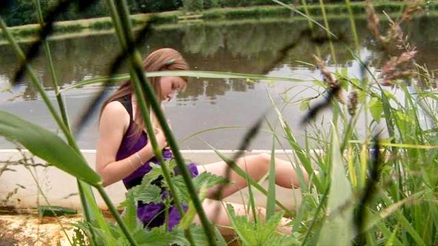 Hot Anouk masturbates her pussy in front the river