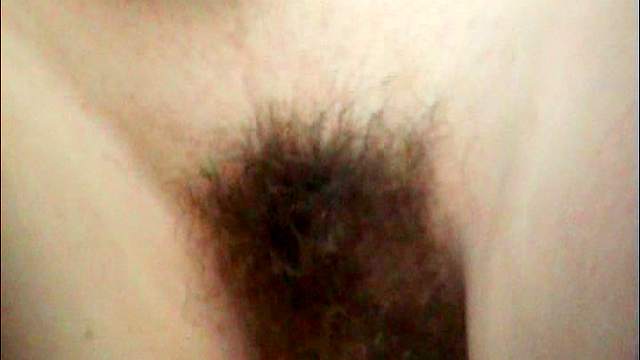 Unshaved pussy is pissing very well