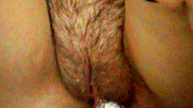Hot flow from tasty-looking hairy pussy