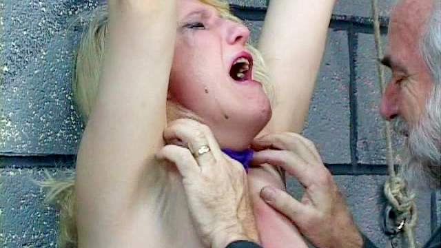 Alluring blonde with big boobs is getting gag in her mouth