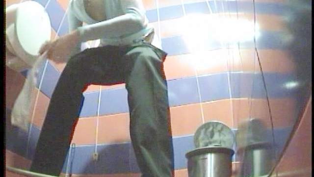 Sweet nice babe is penetrating puss during pissing