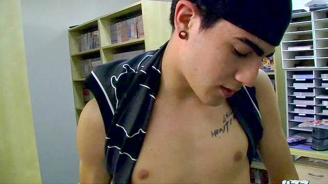 Sexy dude is sucking a dick while lying on the table