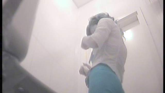 Hot busty one is peeing in the toilet