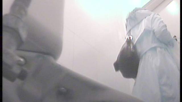 Busty one is peeing and taking off her skirt