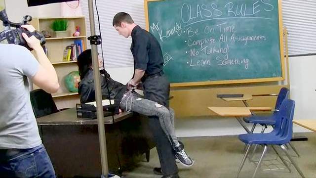 Sweet gay couple is having hardcore sex in the classroom