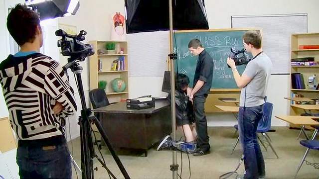 Sweet gay couple is having hardcore sex in the classroom
