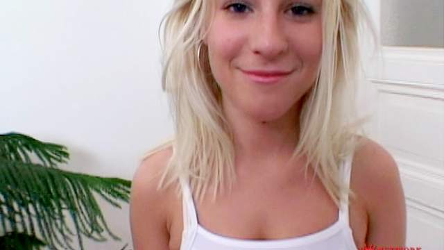 Smiling blonde Nicky Reed is fucking her nice shaved hole