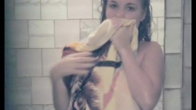 Slender babe is taking a voyeur shower